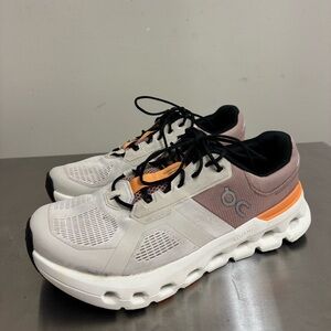 On Running cloud runner 2 in White, Orange, and Black